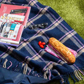 Lifestyle shot of Navy Checkmate Wool Picnic Blanket